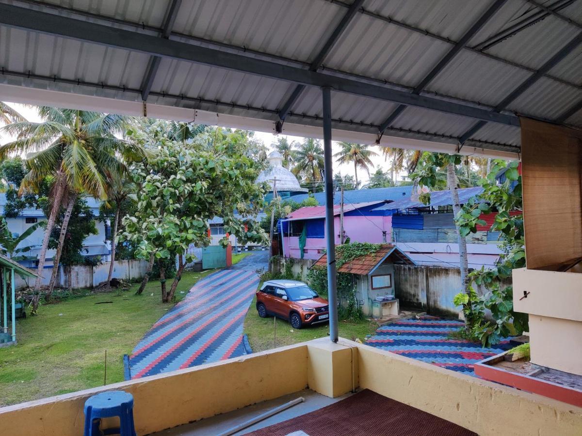 Wind &Waves Apartment โกลลัม ภายนอก รูปภาพ