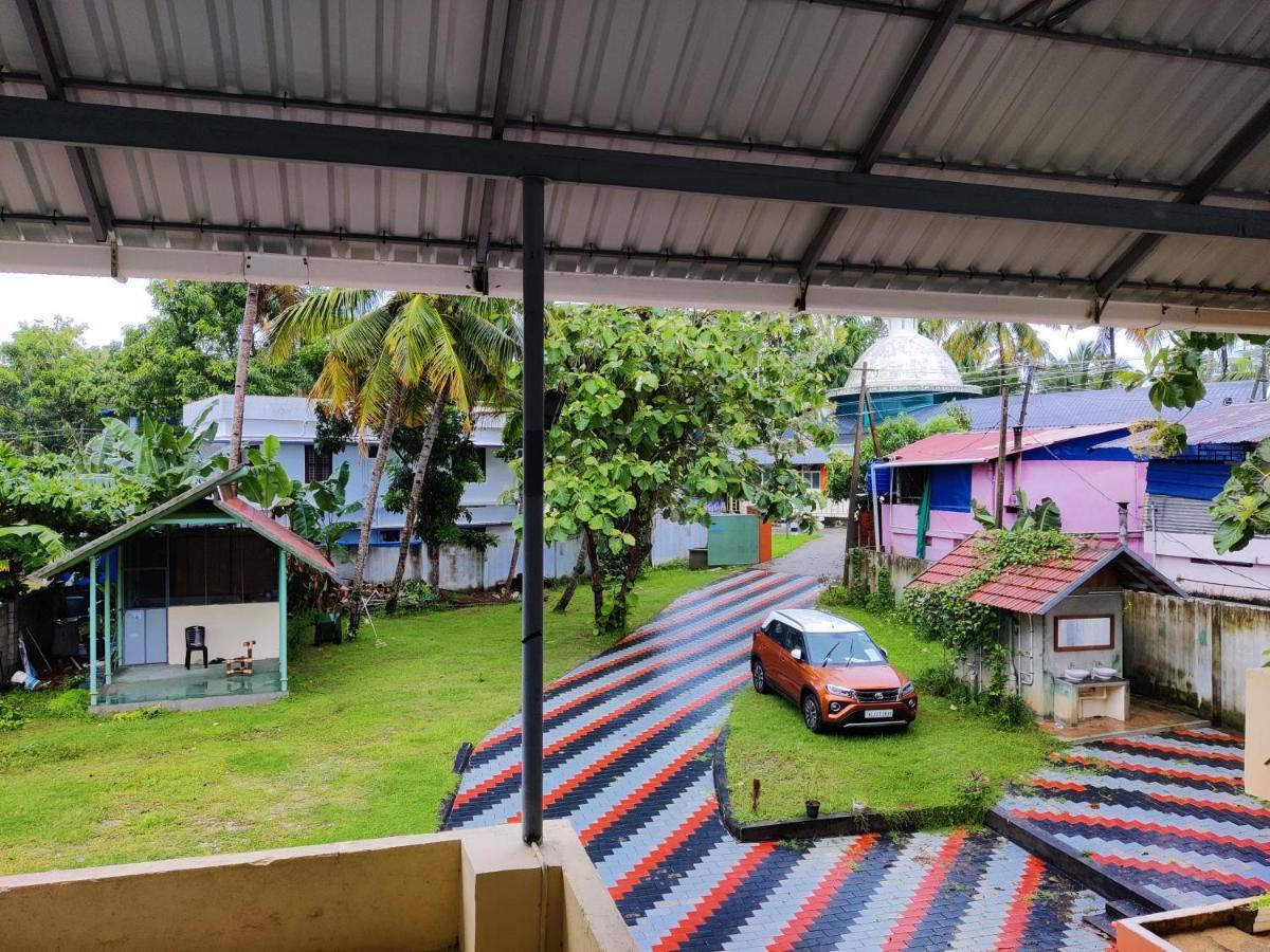 Wind &Waves Apartment โกลลัม ภายนอก รูปภาพ